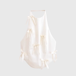 White halter top for women featuring elegant bow decorations in a minimalist style