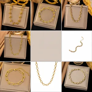 Macro view of 18K gold plated minimalist necklace and bracelet jewelry sets in a display box