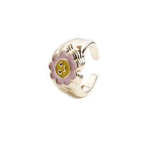 Adjustable gold flower ring with pink petals and a yellow smiley face center