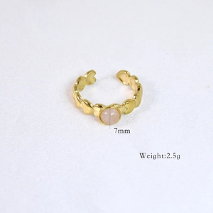 Detail of 14k gold plated heart ring with a 7mm round pink stone and 2.5g weight info