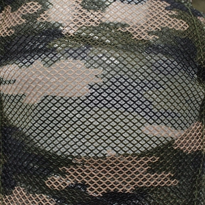 Macro detail of breathable camo mesh fabric on a lightweight summer sun visor cap