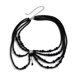 Detail of layered black beaded body chain with silver extension link and small charms