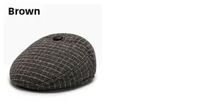 Detail of a brown plaid newsboy cap showing wool texture and top button detail