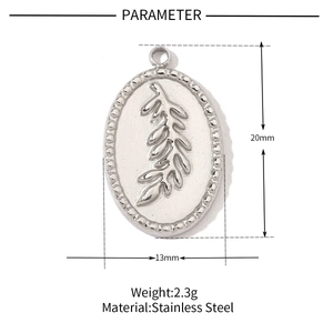 Macro detail of oval stainless steel leaf pendant showing 20mm by 13mm dimensions