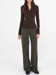 Slim fit brown half-zip mock neck sweatshirt with olive wide-leg trousers for women