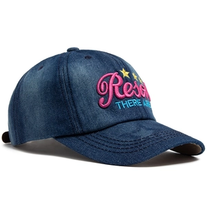 Vintage blue washed denim baseball cap with resort embroidery and adjustable strap for women