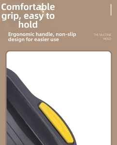 Close-up of silicone brownie mold with yellow anti-slip handles in dark grey finish