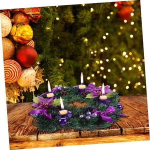 Detail of 33cm Christmas Advent wreath with purple poinsettias, bows and lighted candles