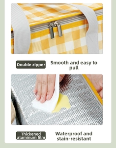 Detail of waterproof aluminum lining and smooth double zippers on picnic bag