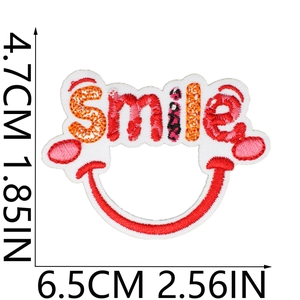 Smile face embroidery patch in red and orange with 6.5cm x 4.7cm size dimensions