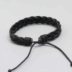 Minimalist hand-woven black leather bracelet with adjustable pull-string closure