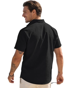 Detailed back side view of a black short sleeve shirt showing textured cotton linen fabric