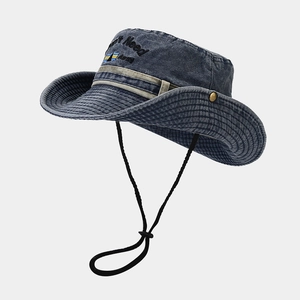 Washed navy denim fishing hat with Need Away embroidery and adjustable chin strap