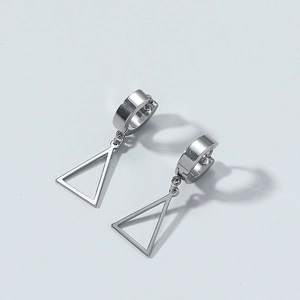 Close-up of silver titanium steel earrings featuring minimalist triangle charm drop