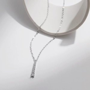 Minimalist S925 silver Y-shaped necklace featuring vertical rows of shimmering Moissanite