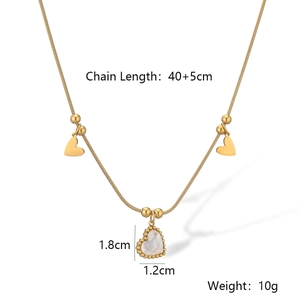 Detail view of gold heart pendant with shell inlay showing dimensions and 40+5cm chain length
