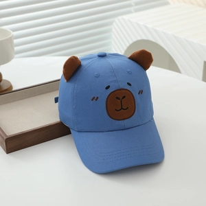 Detailed close-up of blue kids baseball cap featuring 3D ears and cute bear face embroidery