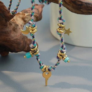 Handcrafted woven necklace with gold 18K plated moon star and key pendants on drift wood