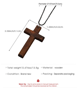 Close-up of gothic wood cross pendant with metal bead chain and size specifications