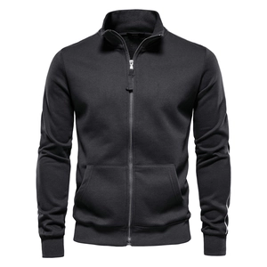 Detail of black sports jacket featuring a stand collar and white stripes on the sleeves
