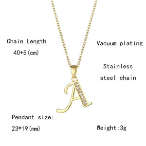 Close-up of 18K gold letter A pendant with cubic zirconia on stainless steel chain
