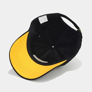Adjustable black and yellow cotton baseball cap with breathable mesh and premium stitching