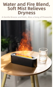 Detail view of mist output and 3D flame lighting on a black humidifier diffuser