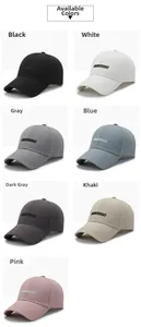 Grid display of baseball caps in seven colors featuring NLSFASHION letter embroidery
