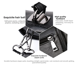 Detail of high-quality silver-tone hardware and litchi texture on black leather boston bag