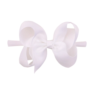 Detail of white grosgrain ribbon hairband with a large bow for toddlers and infants