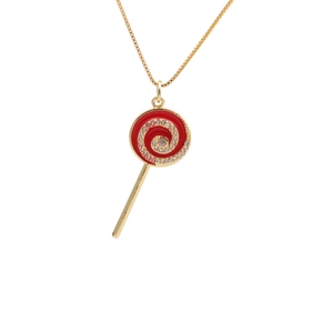 Collier pendentif sucette doré avec tourbillon rouge et cristaux sur une chaîne box