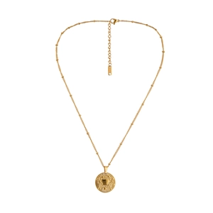 Detail of gold stainless steel necklace with bead chain and crab zodiac pendant