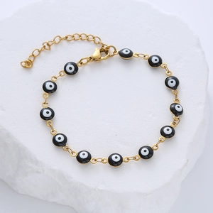 Gold-plated stainless steel chain bracelet with multiple colorful evil eye enamel charms
