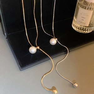 Minimalist gold and silver snake chain necklaces with elegant pearl pendants set