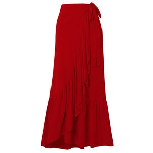 Detail of red wrap maxi skirt featuring layered ruffles and adjustable side waist tie