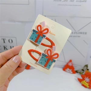 Christmas gift box hair clips set with red glitter bows and handmade display card