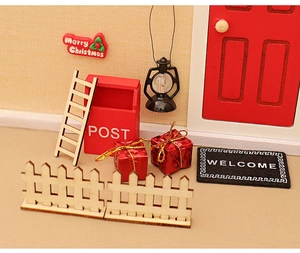 Miniature Christmas dollhouse set with red mailbox, wooden fence, and festive decor accessories