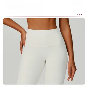 Detail view of high waist ribbed yoga leggings in cream white with seamless front