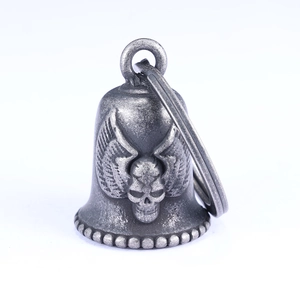 Vintage stainless steel motorcycle guardian bell with skull and wing relief design