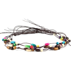 Macro detail of handmade colorful wooden beads woven with ethnic brown fiber cords