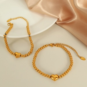 Bracelet en perles d'acier inoxydable plaqué or 18 carats avec pendentif cœur 3D