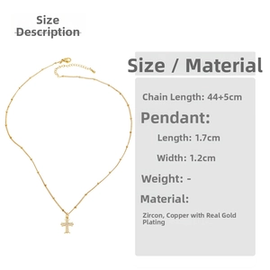 Detailed size specifications for the gold cross necklace showing chain length and dimensions