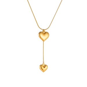 Elegant gold titanium steel Y-necklace featuring double 3D heart pendants on a snake chain