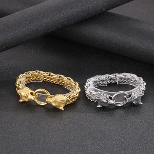 Detailed comparison of gold and silver viking wolf head braided bracelets for men