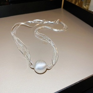 Multi-layer silver snake chain choker necklace featuring a matte brushed imitation pearl