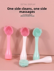 Dual-sided silicone facial brush with fine bristles and massage ripples for deep cleaning