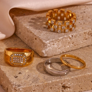 Set of four 18K gold plated stainless steel rings with square micro-inlaid zircons