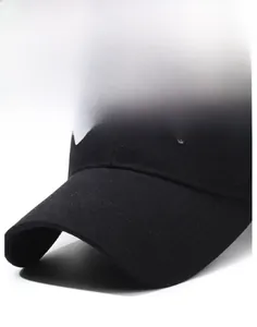 Close-up of black cotton twill baseball cap with detailed white 3D letter embroidery