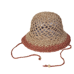 Handcrafted hollow straw sun hat with decorative beads and tassels for summer beach travel