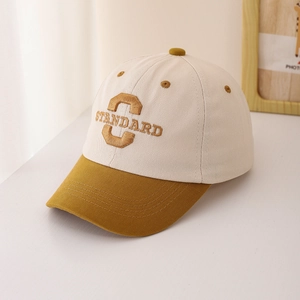 Detail of the thick twill cotton fabric and premium yellow letter embroidery on baseball cap